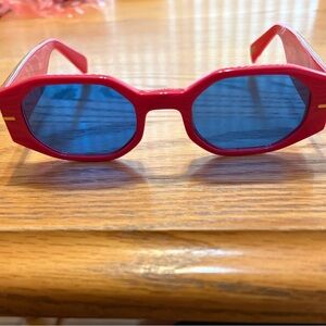 SEE hot pink sunglasses